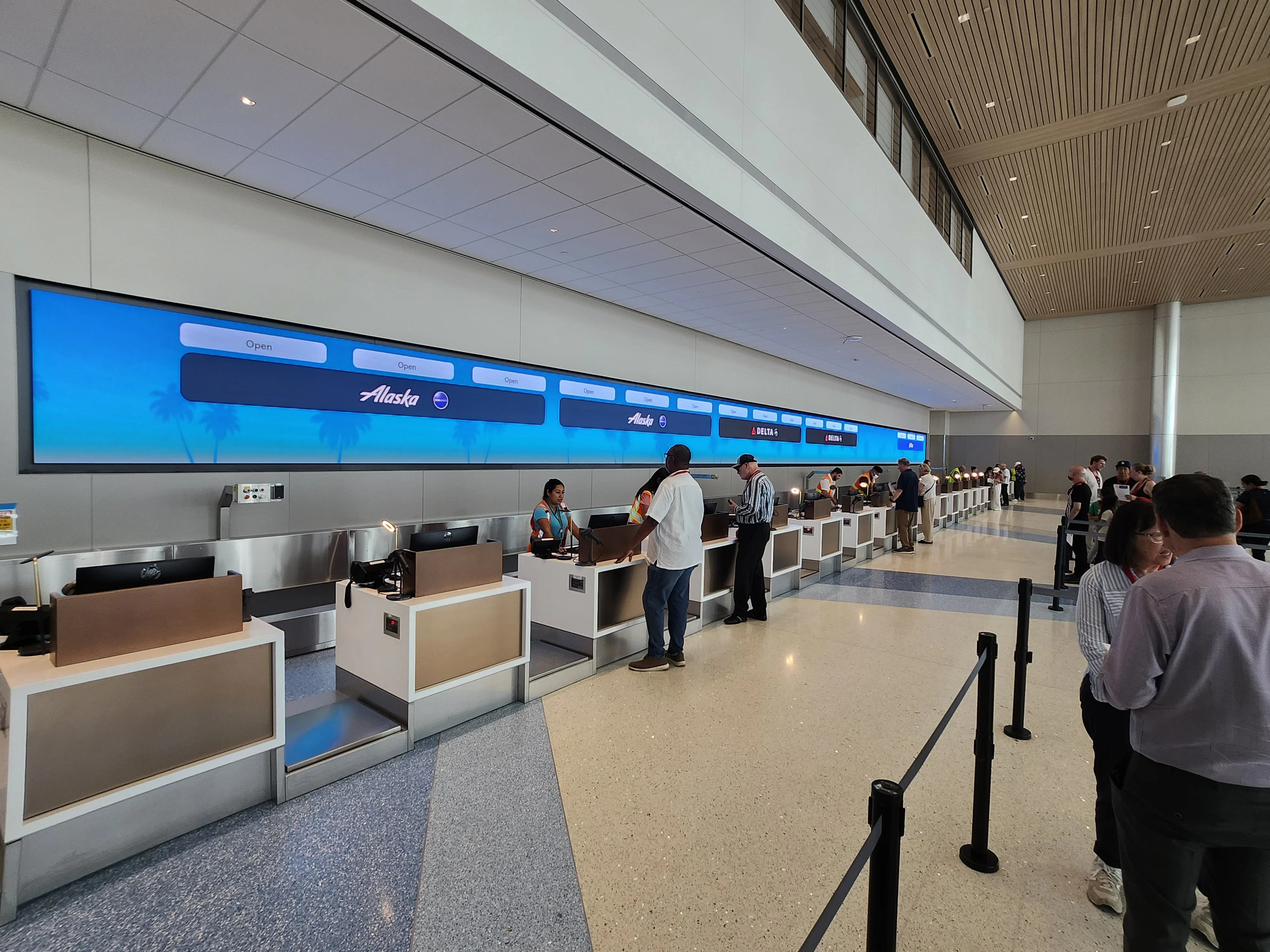 Alaska Airlines and Delta check-in counters inside the new terminal